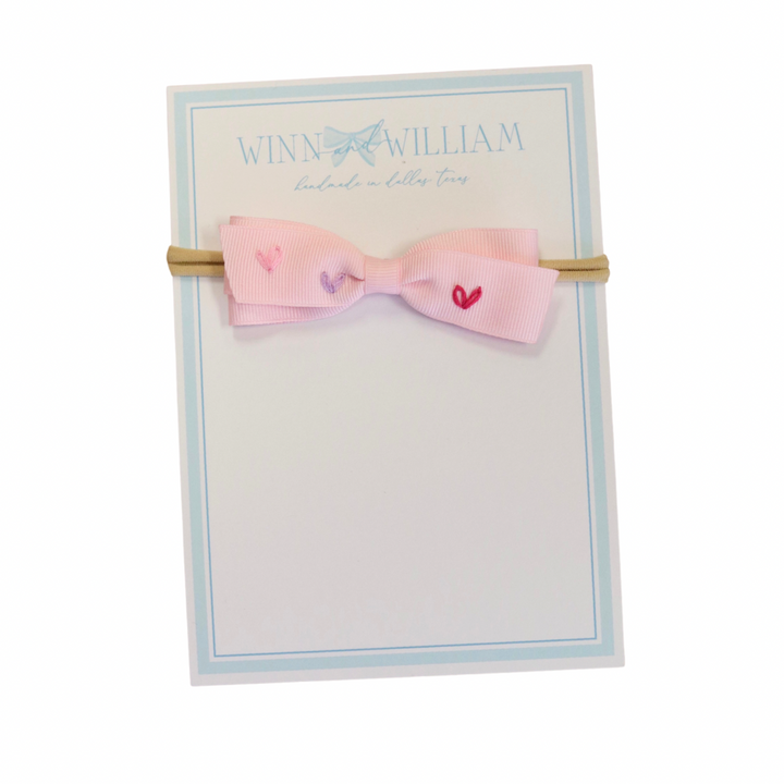 Small Pale Pink Lottie Bow with Emb Hearts on Nylon